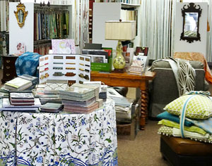 Photo of fabric samples, pillows and furniture